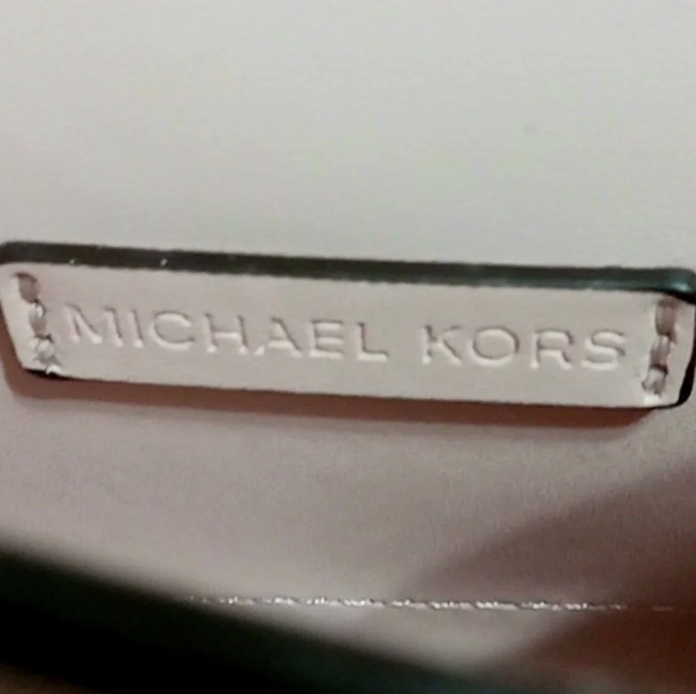 Michael Kors our leather